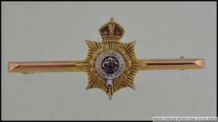A 9ct gold enamelled regimental sweetheart brooch pin with the motto Honi Soit Mal Y Pense and C