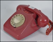 A retro ring dial telephone dating to the 1970's / 80's having a later telephone exchange