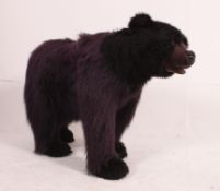 A fabulous large floor standing bear having life like fur and face,