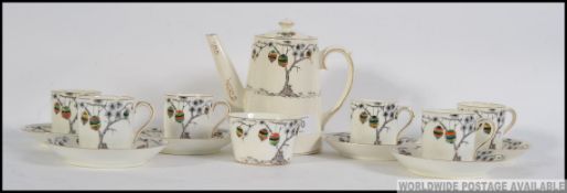 A set of 6 Paragon handpainted coffee cans with saucers , sugar bowl and coffee pot ,