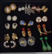 A collection of fifteen pairs of clip on costume jewellery earrings in different styles