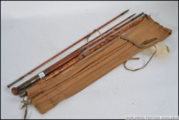 A vintage earlier half of the 20th century Army and Navy three piece split cane fly salmon / trout