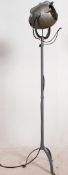 A vintage mid century Industrial Strand theatre spot light / lamp complete with tripod,