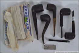 A collection of five Dunhill White spot Shell Briar pipes, to include three straight and two others,