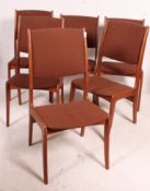 A good set of 4 Danish Dyrlund teak dining chairs raised on shaped legs with original upholstered