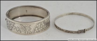 2 vintage silver ladies bracelets both being rococo chased.