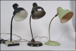 A collection of vintage mid century goose neck anglepoise desk lamps to include 2 French examples