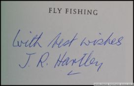 A signed copy of Fly Fishing by J R Hartley along with an Observers book on fishing along with