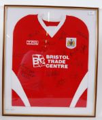 BRISTOL CITY: A Bristol City Football Club signed autographed framed and glazed shirt.