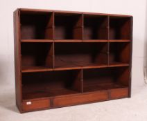An early 20th century mahogany open fronted Industrial office stationary cubby cabinet raised on