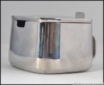 A stunning contemporary A di Alessi sugar bowl by Kristiina Lassus being marked to the base.