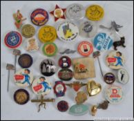 A collection of old enamel and other badges to include Felix The Cat Tennis Player c1920's,