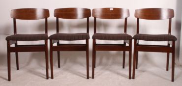 A 1970's retro draw leaf table and matching four chairs,