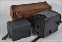 A late 19th early 20th century R & J Beck Frena magazine camera, textured black,
