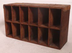 An early 20th century Industrial pine office pigeon hole stationary cabinet cubby.