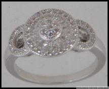 A silver and CZ dress ring