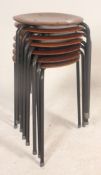 A collection of 8 rare stacking stools by Arne Jacobson .