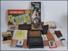 A collection of vintage games to include Picture Lotto, vintage Playing Card decks in packs,
