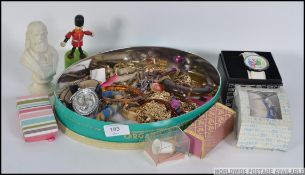 A collection of curios to include an unused boxed JLS watch, a small Parian ware bust,