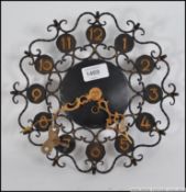 A 1950's German wall clock by Hugo Krause Kitzbuhel in working order with decorative facia.