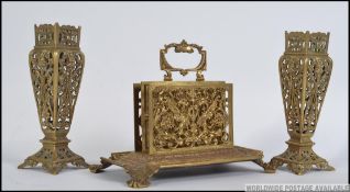 A three piece 19th century brass Victorian desk tidy set,