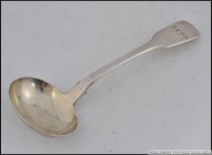 A Georgian silver hallmarked ladel spoon of nice size with monogram to handle possibly by William