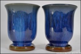 Two Bourne Denby Danesby ware Electric Blued drip glazed vases of goblet form being signed and
