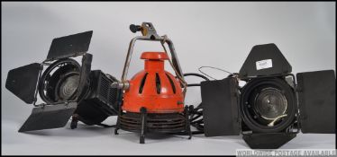 A pair of vintage 20th century Lee Colotran theatre / studio lights with the barn door attachments