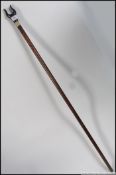 A silver collared hallmarked horn walking cane ????