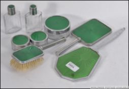 A vintage 1960's retro chrome and green backed 8 piece gentlemans dressing table set comprising