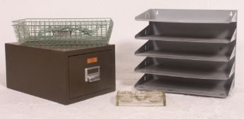 A collection of retro vintage industrial metal desk items,