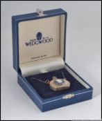 A silver 925 ladies perfume moon flask necklace pendant and chain having inset Wedgwood cameo.