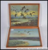 Two vintage 20th century Peter Scott prints of watercolour scenes of marshlands featuring ducks in