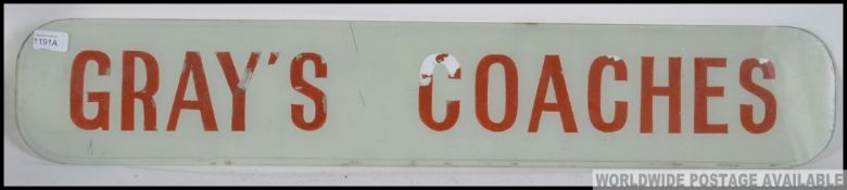 A large rare vintage retro Grey's Coaches glass advertising sign in original condition .