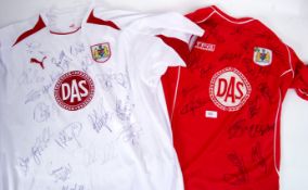 BRISTOL CITY: Two fully signed Bristol City Football CLub shirts.