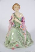 A Royal Doulton figurine entitled Aileen model No HN1645 bearing old markings to the base,