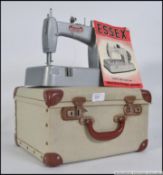An early 20th century cased childs sewing machine by Essex.