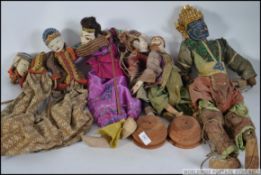 A collection of vintage possibly Indonesian puppets,