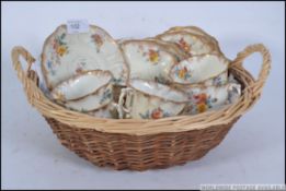 A 19th century Victorian China tea service with applied floral and gilt decoration,