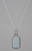 A silver cz and opalite rectangular pendant and necklace,