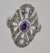 An Art Deco style ladies silver and marcasite with amethyst dress ring. Total weight 5.