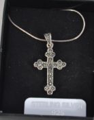 An Italian 925 silver pendant necklace with marcasite set crucifix pendant. Marked 925 Italy.