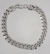 A chunky heavy Italian 925 silver curb link bracelet with lobster claw clasp.
