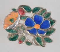 A vintage silver plate end enamel brooch in the form of wild roses with loop clasp. Measures 5cms.