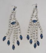 A pair of large vintage 1980's large chandelier earrings set with white and sapphire blue