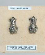 An early pair of Art Nouveau Sterling silver marcasite earrings with screw backs.