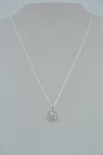 A 925 silver Art Deco style pendant necklace with a pave and baguette set CZ set pendant strung on
