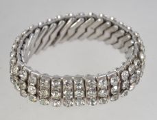 A vintage 1950s epanding rhinestone set bracelet. Marked Empire Made.