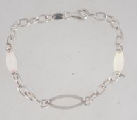 A 925 silver bracelet with pierced and plain marquise decorative links, with lobster claw clasp.