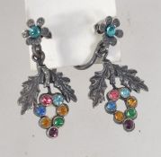 A pair of 1950's Czech filigree silver tone screw back earrings set with multi coloured rhinestones